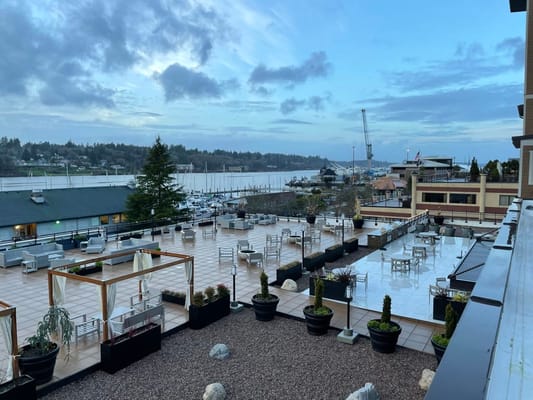 Outdoor seating area with waterfront view