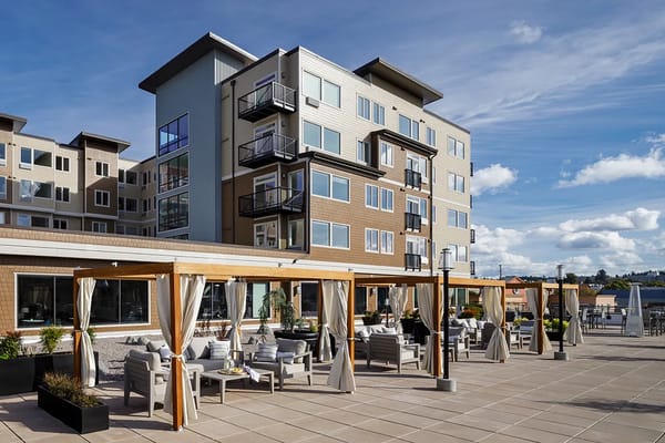 Exterior view of Harbor Heights with outdoor seating area