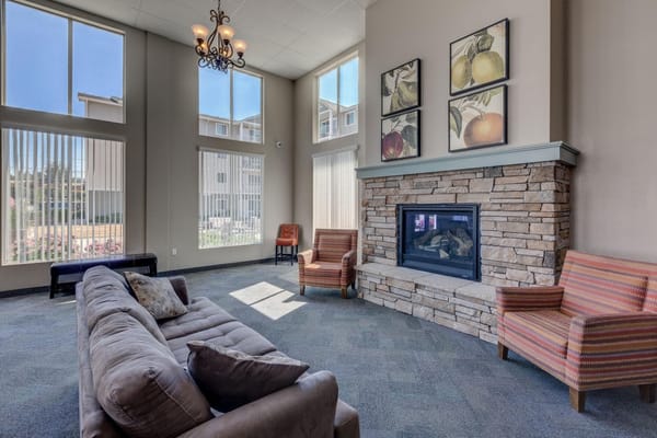 Bright and inviting common area with a fireplace