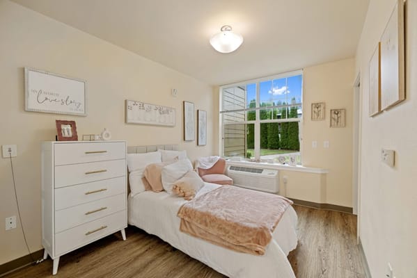 Cozy resident room with natural light and decor