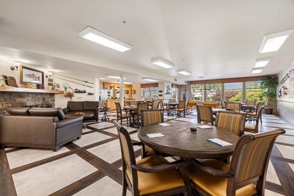 Interior common area with seating and dining tables