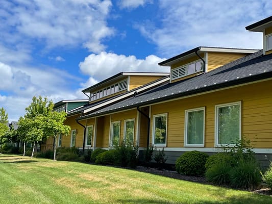 Building exterior of Cottages of Lacey with landscaping