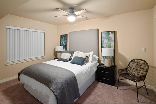 Cozy private bedroom with a bed and decor