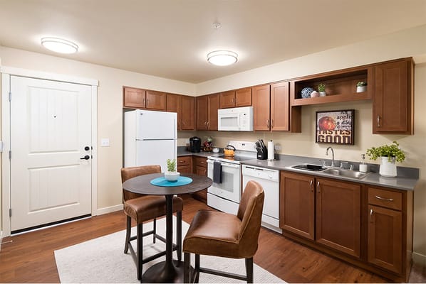 Bright, modern kitchen area in a resident's unit