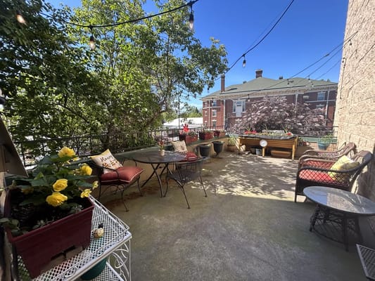 Outdoor patio with seating and plants