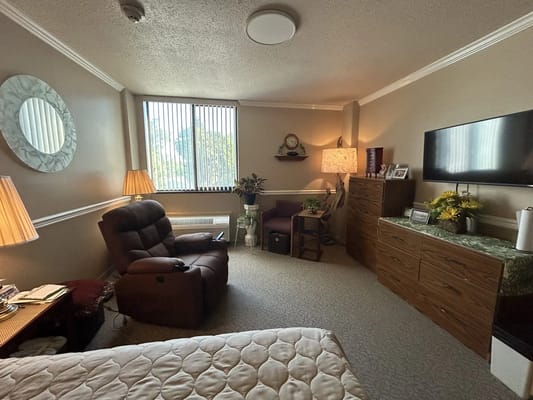 Cozy private room with comfortable furniture and decor