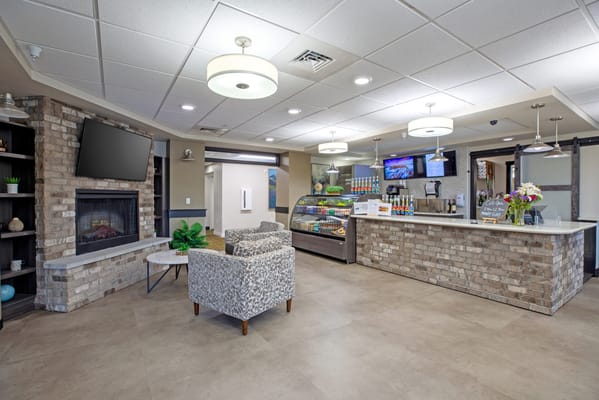 Bright and inviting common area with seating and a café setup