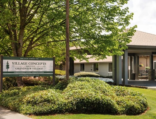 Sign for Village Concepts of Marysville - Grandview Village with lush greenery