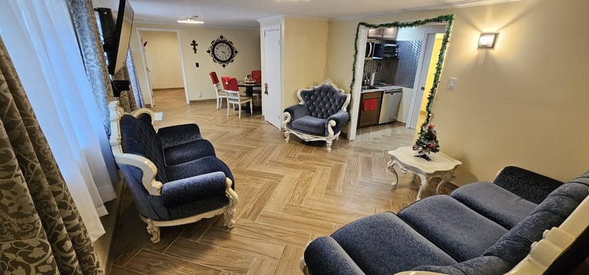 Interior seating area with plush chairs and a small table