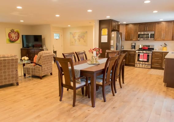 Bright interior view of a modern kitchen and dining area