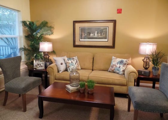 Cozy living room with comfortable seating and decorative lamps