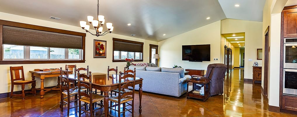 Spacious common area with dining table and living space