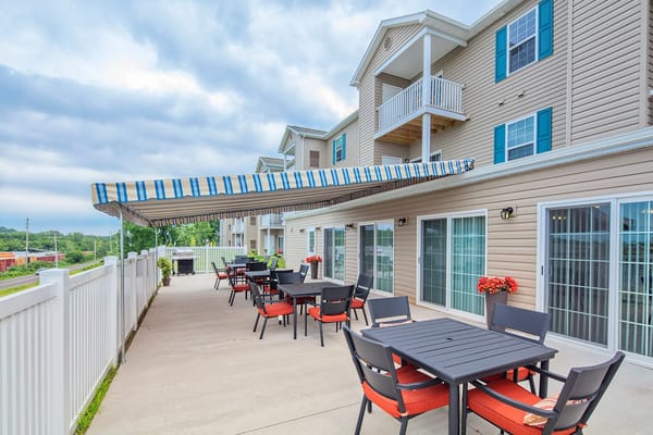 Outdoor patio seating area at Glenmary Grove Senior Apartments