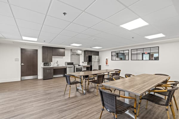 Spacious kitchen and dining area with modern furnishings at Christian Towers.