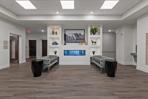 Modern lobby area with seating and decorative elements