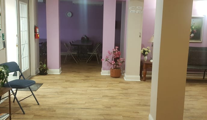 Interior common area with tables and chairs.
