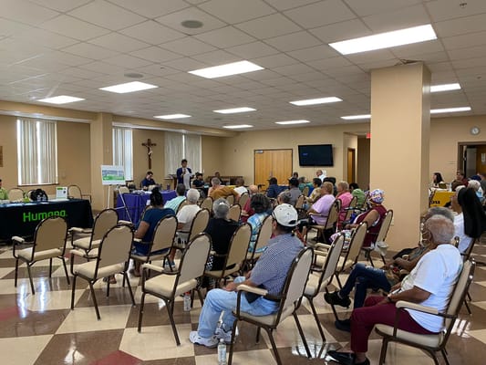 Residents attending an event in a community room