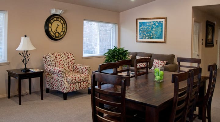 Cozy common area with seating and clock