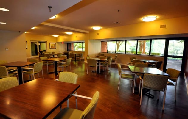 Bright dining room with tables and chairs