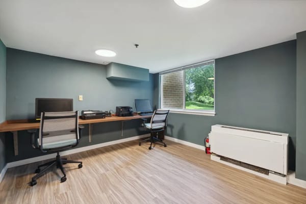 Modern office space with desk and computer at Hickory Ridge Place