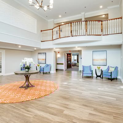 Bright and spacious lobby with seating and decorative accents