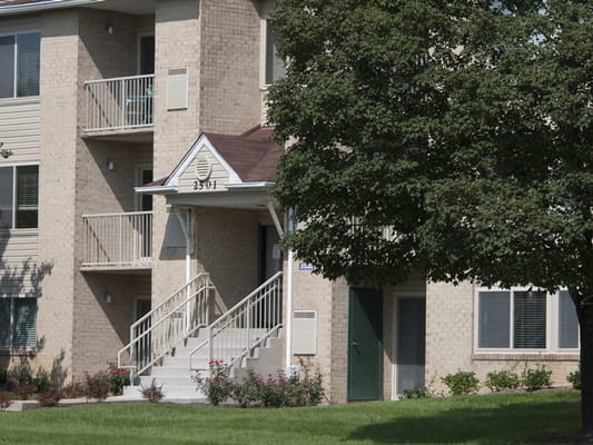 Exterior view of a senior living building entrance