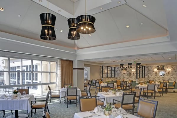 Elegant dining area with tables and modern lighting