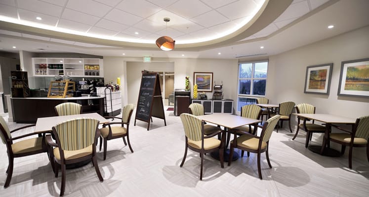Modern dining area with tables and chairs