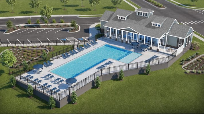 Aerial view of a pool and building exterior