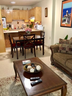 Cozy living room area of an assisted living unit