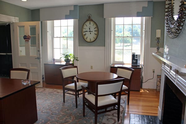 Cozy sitting area with a round table and chairs