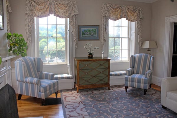 Bright and inviting common area with large windows