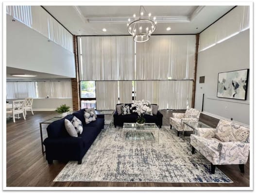 Bright common area with comfortable seating and decor