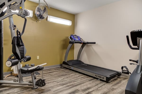 Interior gym area with exercise equipment