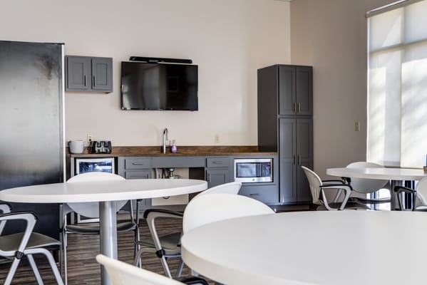 Bright communal dining area with modern furnishings