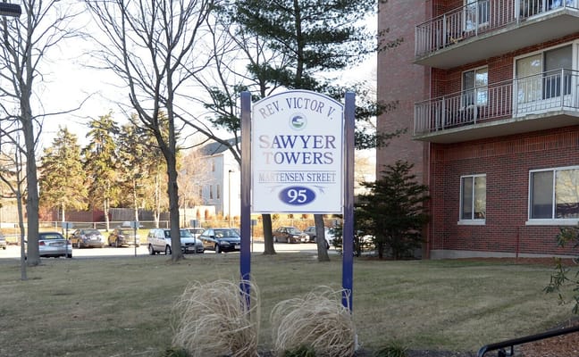 Exterior view of Sawyer Towers building sign