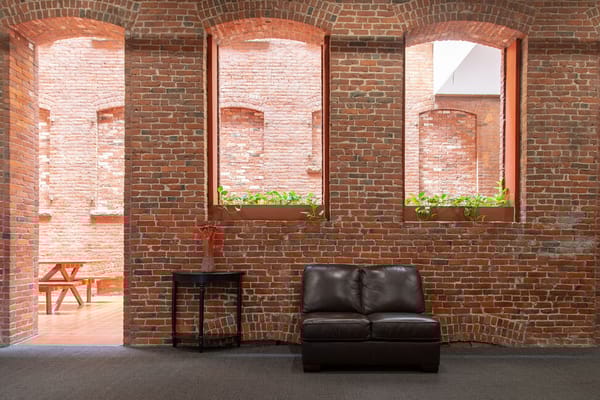Cozy interior space with brick walls and seating