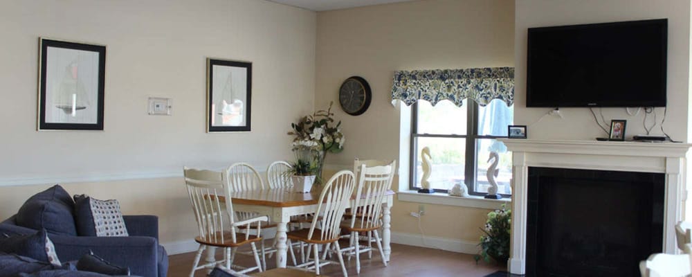Interior dining area with a table and chairs