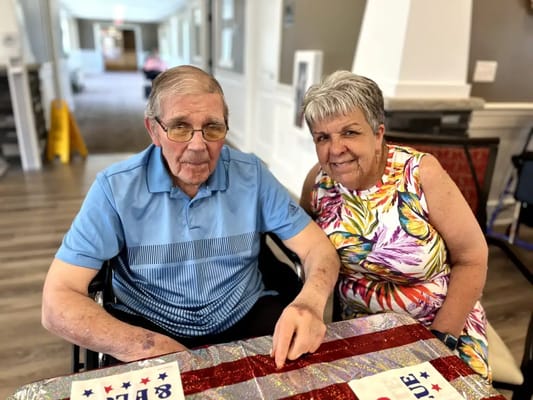 Residents socializing in a bright common area