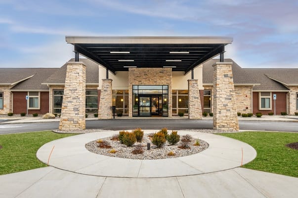 Exterior view of Hampton Manor with entrance structure