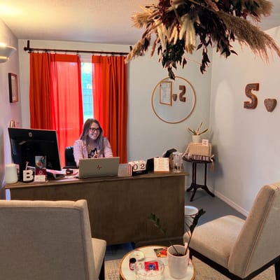 Staff member at the facility's reception area