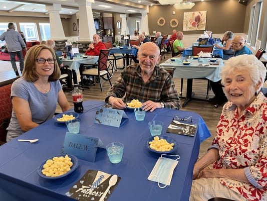 Residents celebrating Father's Day with snacks