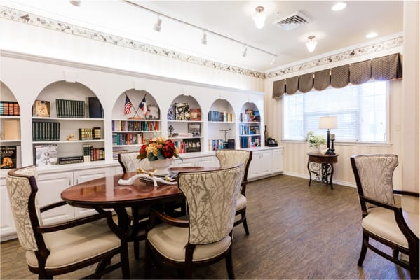 Cozy common area with bookshelves and seating
