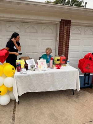 An event table with a resident and staff member