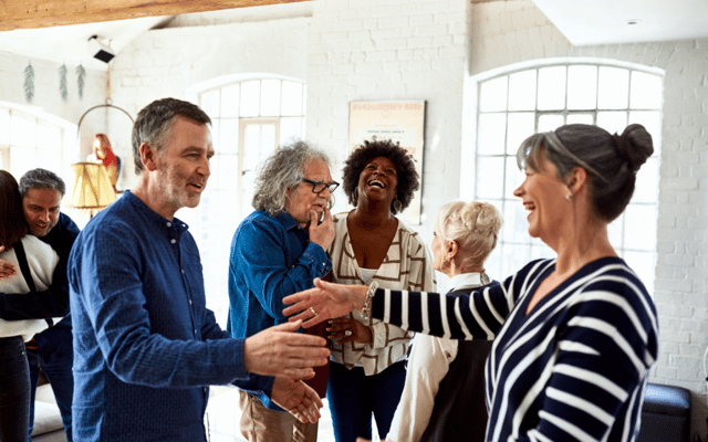 Residents enjoying a lively interaction in a common area