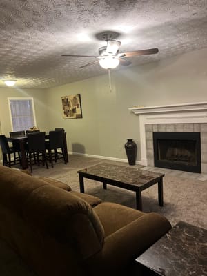 Cozy living area with couch and dining table