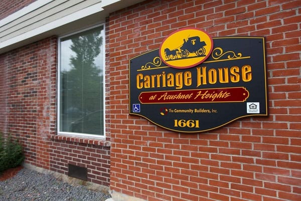 Facility sign for Carriage House Apartments