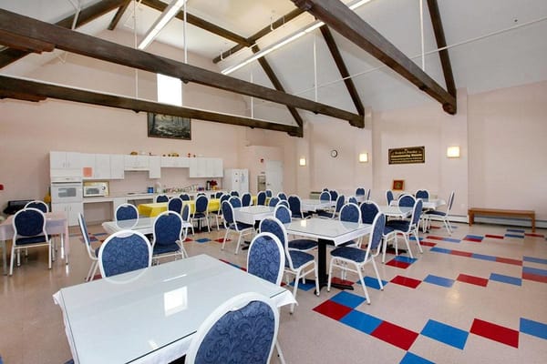 Bright dining area with tables and chairs