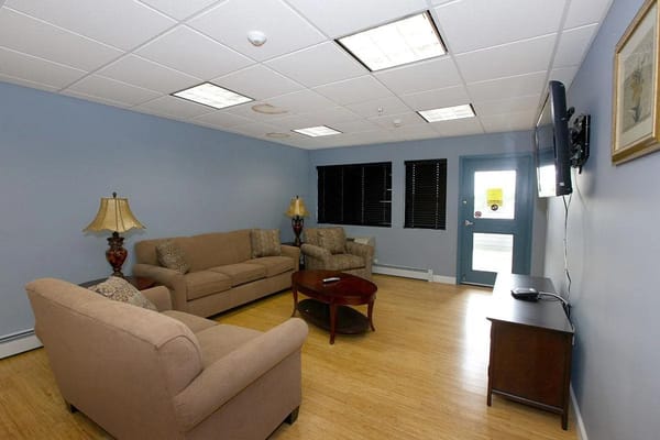 Cozy common area with seating and natural light