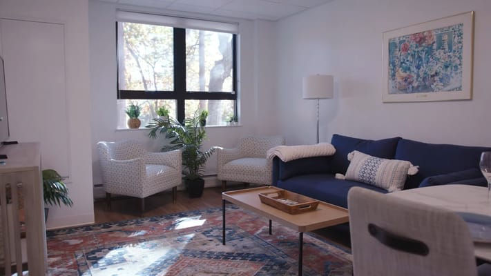 Cozy interior living area with seating and plants